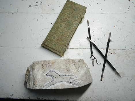 begin alabaster carving project of horses and stone carving tools
